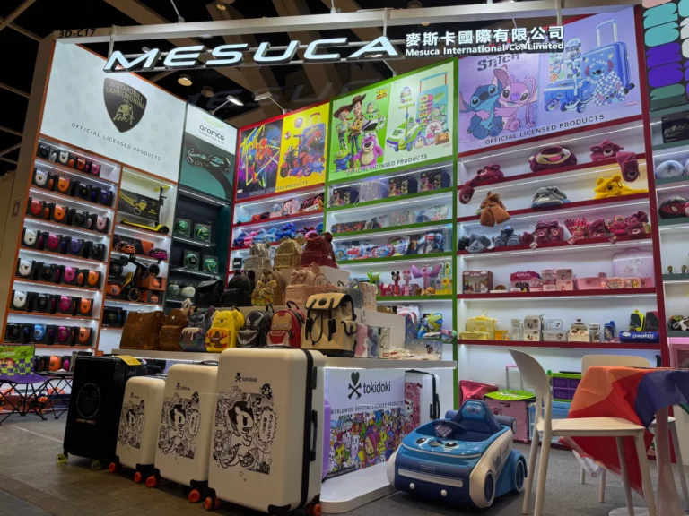Entrance of MESUCA’s Hong Kong trade show booth, displaying tokidoki luggage, Lamborghini & Disney official licensed products.